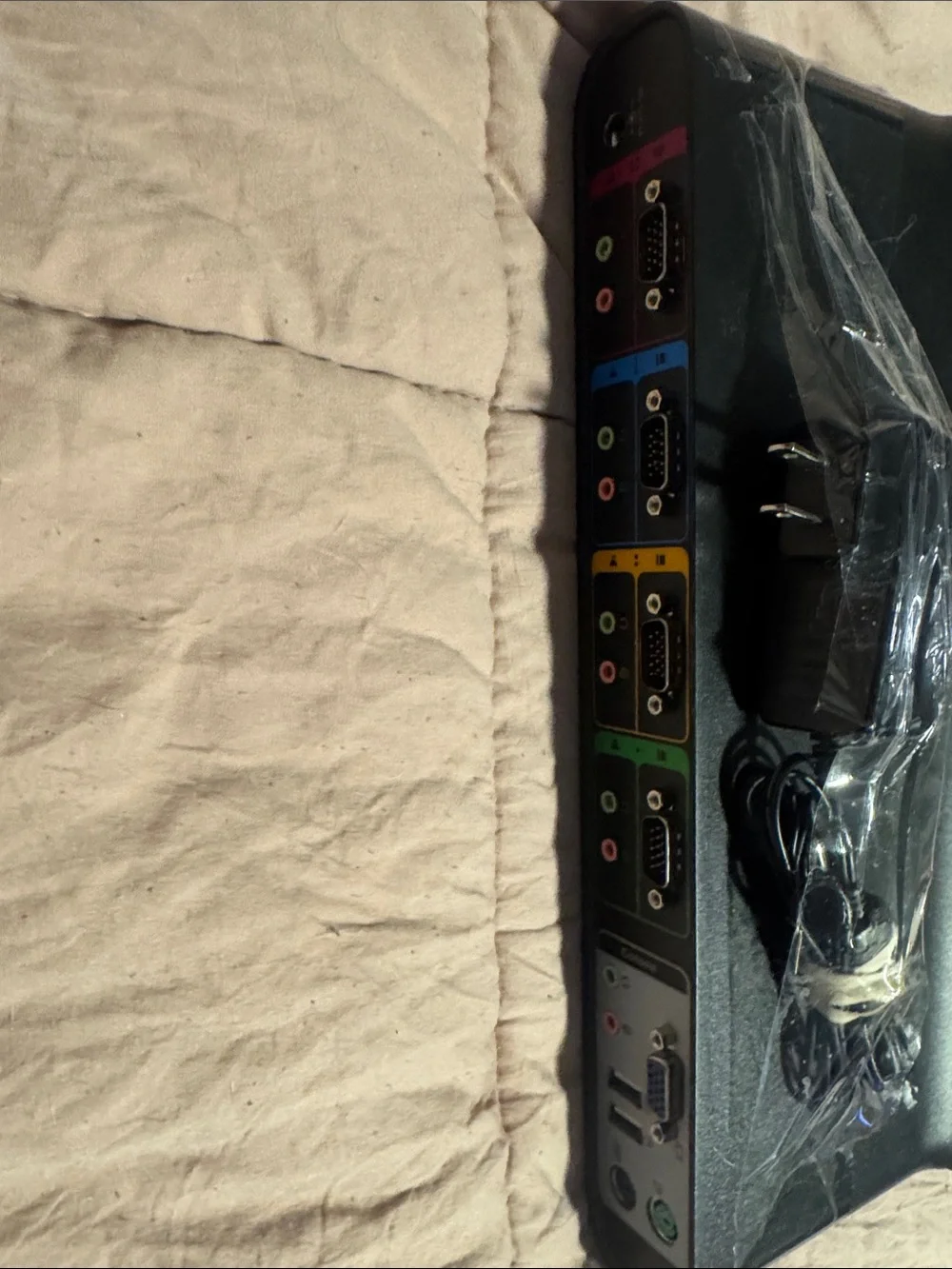 Belkin Black 4-Port Power Strip with Green Yellow Blue Red Ringed Outlets